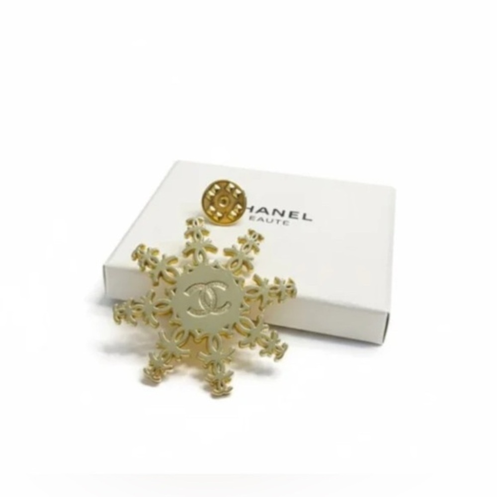Brand new Chanel Gold Snowflake Brooch